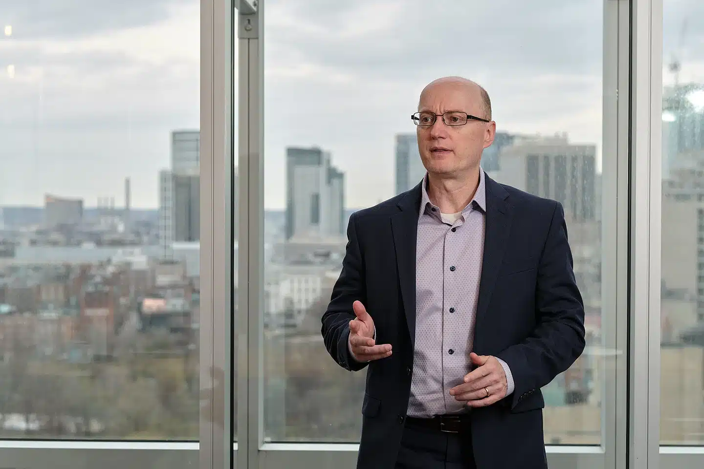 Mark Goodale presenting strategic business consulting and planning in a boardroom.
